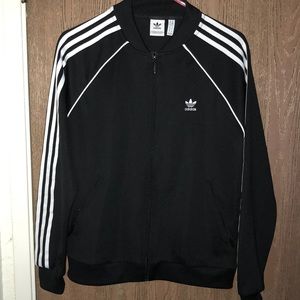 Black adidas track jacket.